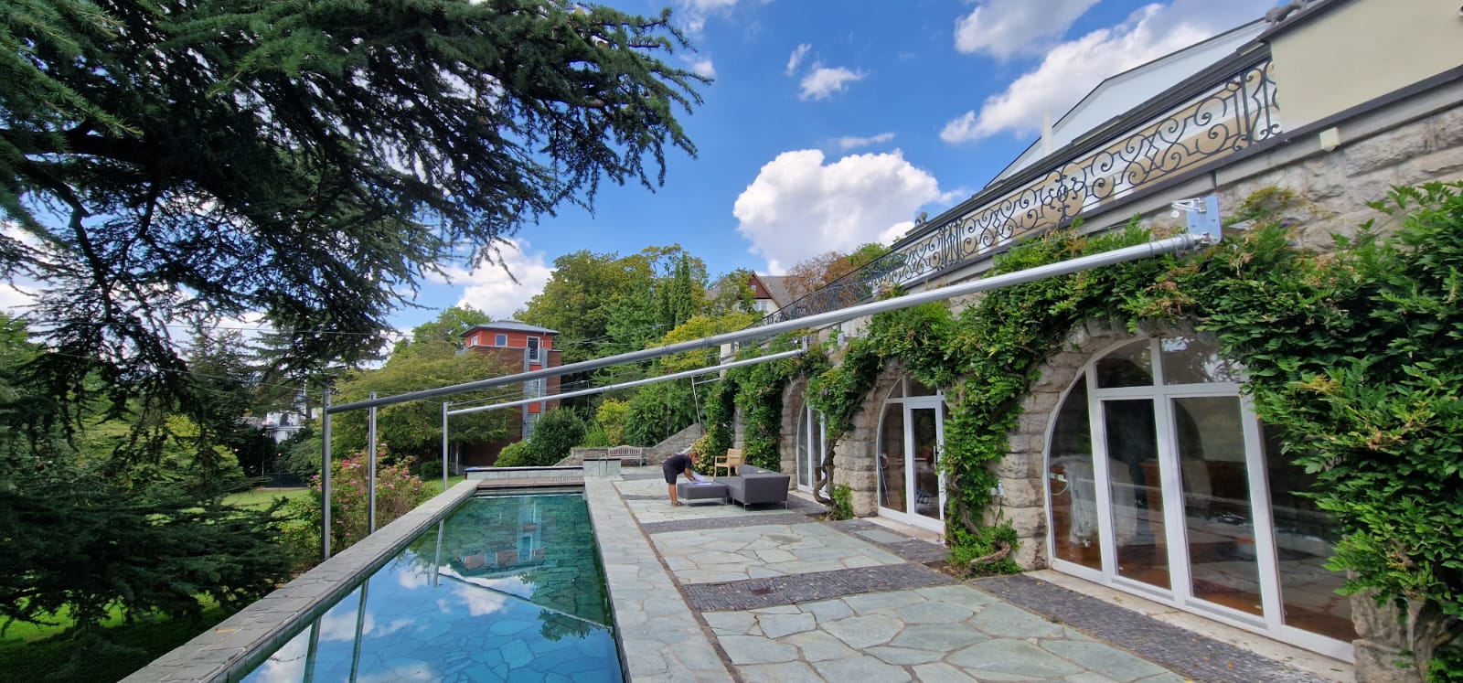 Aufbau einer E2 Anlage über Terrasse und Pool
